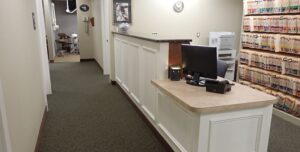Check out desk and hallway inside the Scott A. Gradwell, D.M.D., F.A.G.D, P.C. office in Allentown, PA